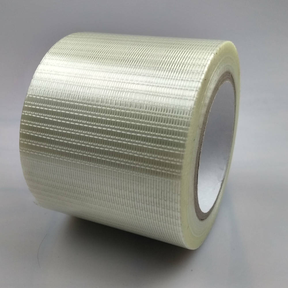 Roll of 100mm Glass Filament Crossweave Strapping Tape on its back