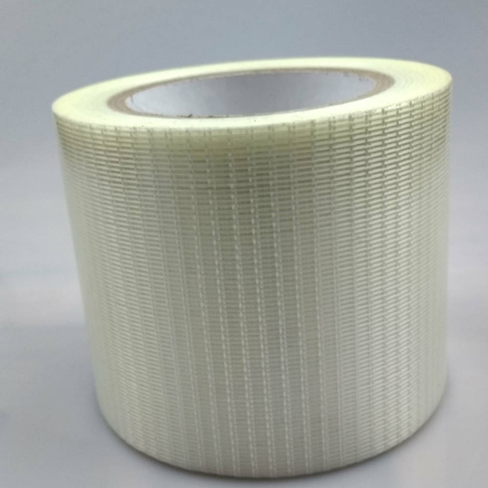 Roll of 100mm Glass Filament Crossweave Strapping Tape on its side